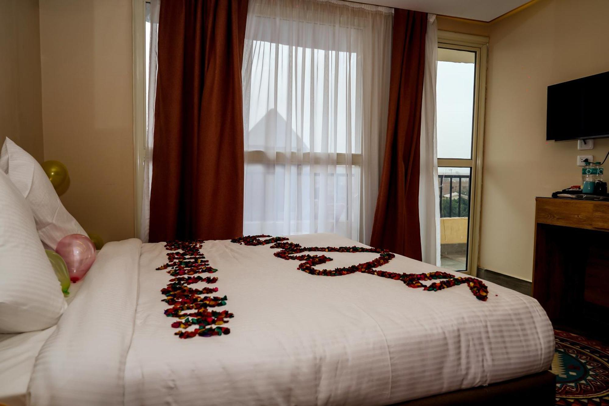 Pyramids Hotel Kafrat al Jabal ภายนอก รูปภาพ